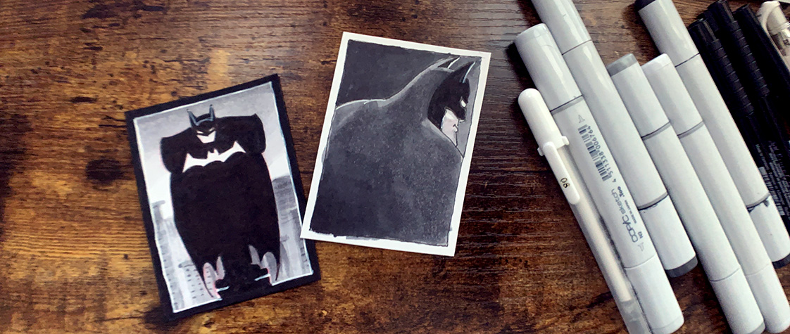 Desktop of sketch cards with Comic markers